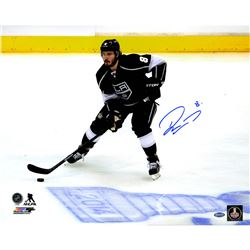 Drew Doughty Signed Los Angeles Kings Skating By 2014 Stanley Cup Logo On Ice 16X20 Photo