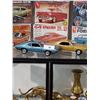 Image 1 : 2 Ertl '66 '69 Pontiac GTO Diecast Cars