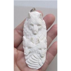 Hand Carved Wolf Family Pendant