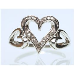 #33-STERLING SILVER DIAMOND RING SIZE 7