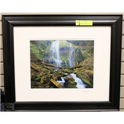 FRAMED PICTURE OF A MOUNTAIN WATERFALL SINGED BY