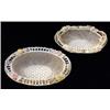 Image 1 : A Belleek lily flowered basket, 1921-1954, four strand, of oval form with scrolling handles and a...