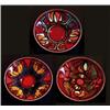 Image 1 : A Poole pottery dish, 1960's of shallow circular form, decorated with an abstract floral design i...