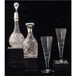 A pair of Mead glasses, late 18th/early 19th Century, the tapering bowl on a stem with a ring of...