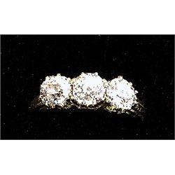 A three stone diamond ring, set with old brilliant cut diamonds. Total diamond weight estimated a...