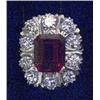 Image 1 : A rectangular cluster ring, set with a centre Verneuil synthetic ruby surrounded by brilliant cut...