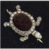 Image 1 : A Victorian style brooch, in the form of a turtle, with a cabachon garnet body and rose-cut diamo...