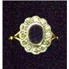 Image 1 : An Edwardian style oval cluster ring, set with a centre blue sapphire surrounded by brilliant cut...