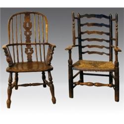 A 19th Century ash winged wavy ladder back elbow chair, the graduated horizontal rails flanked by...