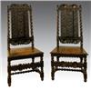 Image 1 : A pair of Carolean oak high backed side chairs, circa 1690, the rosette carved top rail above a b...