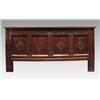 Image 1 : An early 18th Century oak coffer, the quadruple panelled hinged top over a rosette and foliate ca...