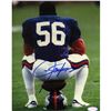 Image 1 : Lawrence Taylor Sitting On Football And Helmet Vertical 8X10 Photo