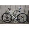 Image 2 : 2 BIKES: WHITE NO NAME ROAD BIKE AND BLUE ROCKY MOUNTAIN FRONT SUSPENSION MOUNTAIN BIKE