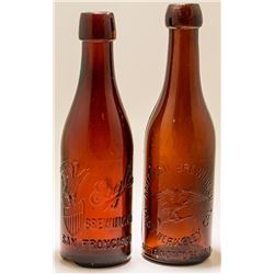 Two Embossed Eagle Beer Bottles