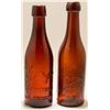 Image 1 : Two Embossed Eagle Beer Bottles