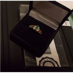 RING - 10K YELLOW GOLD - .3CT MARQUIS FACETTED EMERALD AND 6 VS CLARITY DIAMONDS - 2.4 GRAMS TW - IN