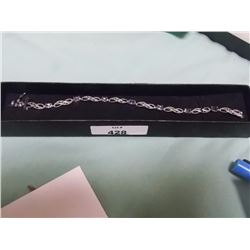 BRACELET - 8 OVAL FACETTED PURPLE AMETHYST & DIAMONDS IN STERLING SILVER SETTING - APPROX. RETAIL $4