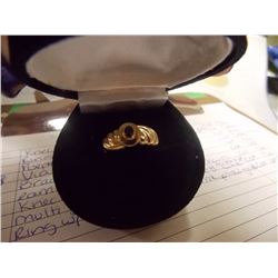 RING - 10KT YELLOW GOLD WITH SOLITAIRE .24CT OVAL FACETED GARNET GEMSTONE - BAZEL-SET - INCLUDES CER