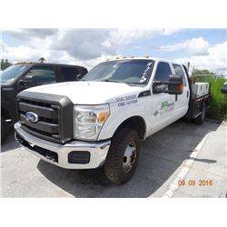 2012 Ford F350 S.D. 4 x 4 9' D.P. Flatbed Crew Cab Truck