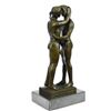 Image 9 : Two Gay Men Engaging In A Flirtatious Kiss Statue