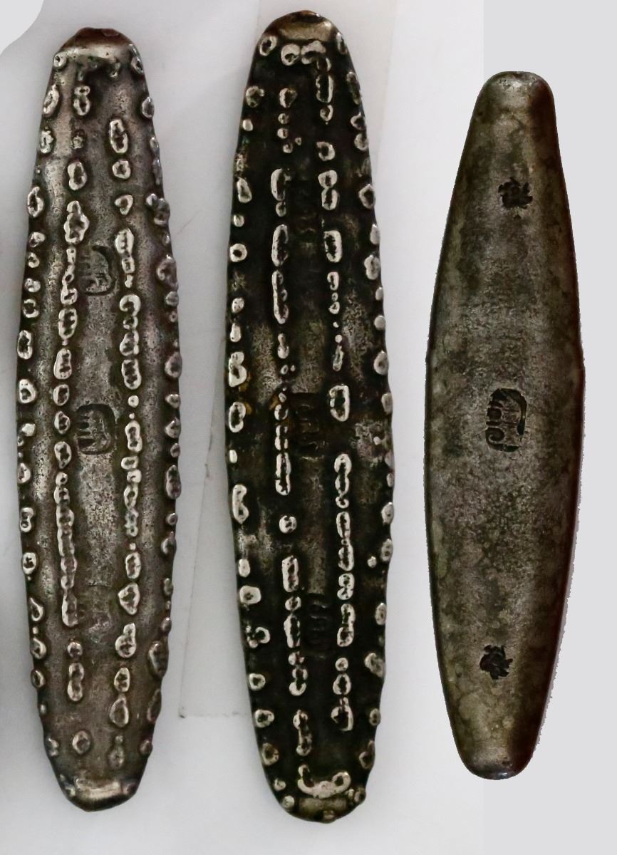 Collection of 11 pieces of silver primitive money from southeast Asia ...