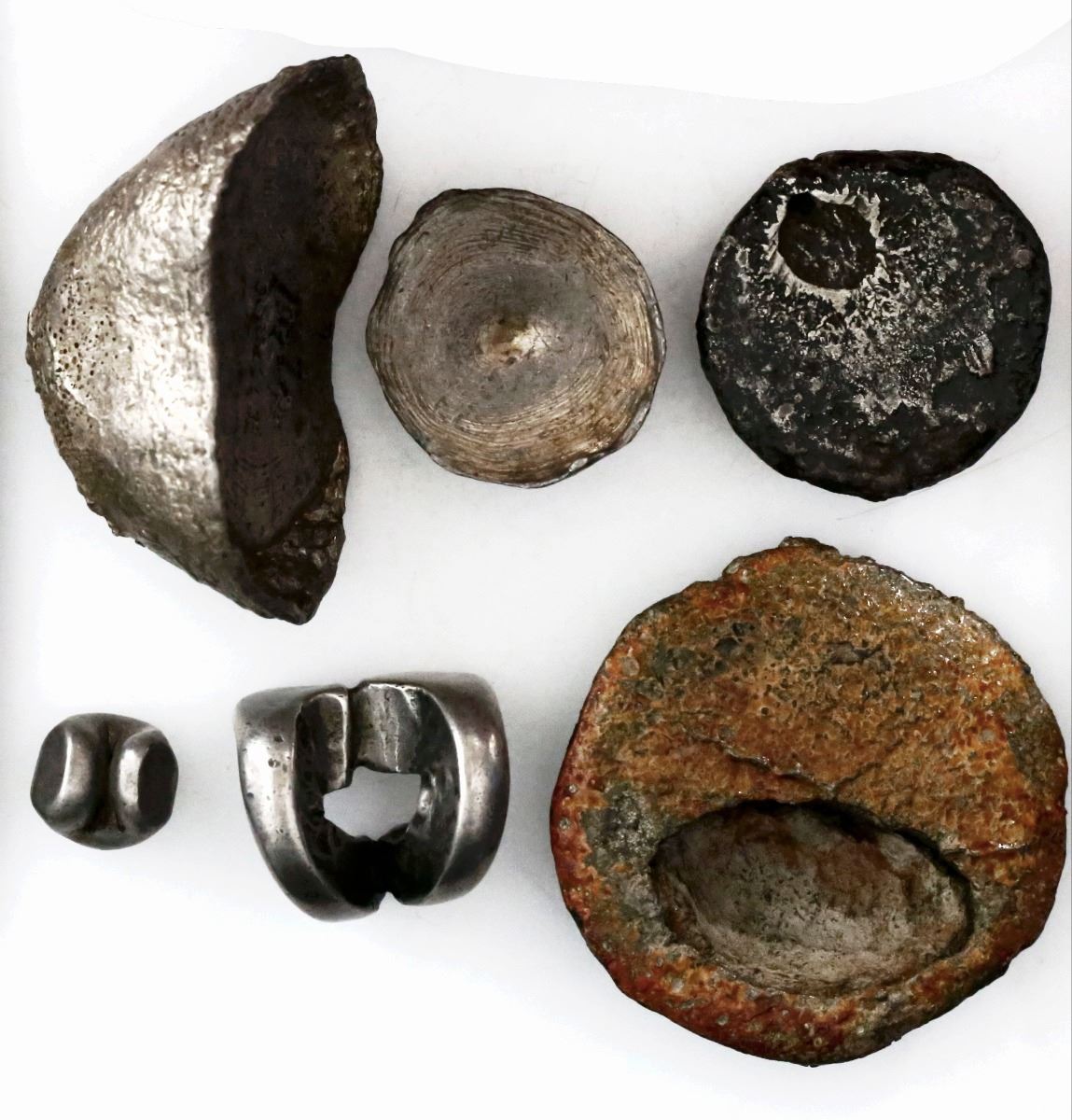 Collection of 11 pieces of silver primitive money from southeast Asia ...