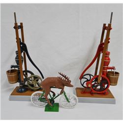 John Deere toy bicycle & (2) toy water pumps