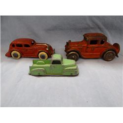 2 vintage cast iron toy cars and Tootsie Toy truck