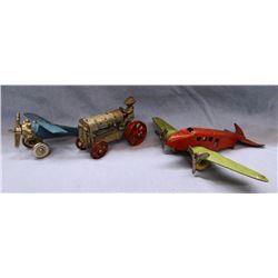 Lindy vintage cast iron toy airplane, vintage cast iron tractor and pressed steel airplane
