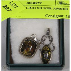PAIR OF STERLING SILVER AMBER LOCKETS