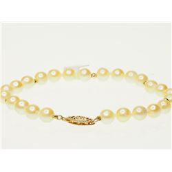 #37-14K GOLD FRESHWATER PEARL BRACELET