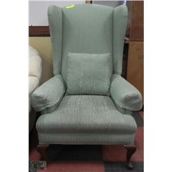 TALL GREEN ARMCHAIR