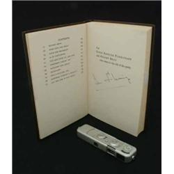 A German Minox BL Subminiature Spy camera, with distance dial, case and chain, 4.5ins open....