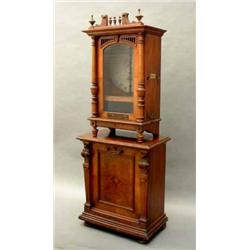 A 19.25ins Symphonion disc musical box on stand, German circa 1900, contained in upright walnut c...