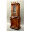 Image 1 : A 19.25ins Symphonion disc musical box on stand, German circa 1900, contained in upright walnut c...