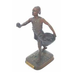 Debut - bronze figure of a North-African youth, selling fruit, on a naturalistic rectangular base...