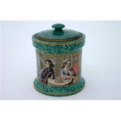 A Prattware malachite tobacco jar and cover, with inner tamper, the transfer-printed scene titled...
