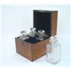 Image 1 : A Victorian burr-walnut decanter box, brass-bound, with hinged cover inset monogrammed cartouche...