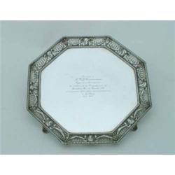A William Collins octagonal silver salver, the central panel with engraved inscription, surrounde...