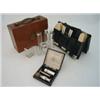 Image 1 : A gentleman's travelling toilet set, in brown leather case, with lift-out section, fitted ivory b...