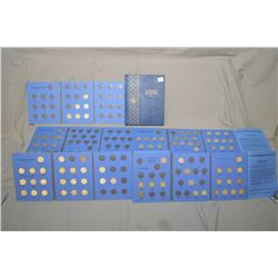 Six coin folios of Canadian quarters