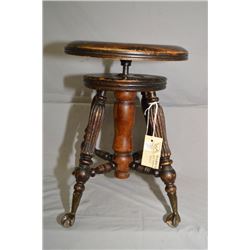 Antique adjustable piano stool with glass ball and claw feet