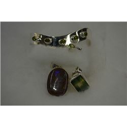 Selection of sterling silver and gemstone jewellery including blue fire ammolite pendant, retails $ 