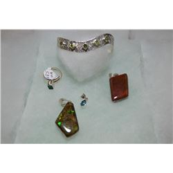 Selection of sterling silver/gemstone jewellery including cuff bracelet set with five square emerald