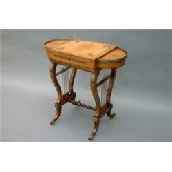A Regency amboyna and rosewood games table, marquetry-inlaid in ebony, fitted for backgammon and...