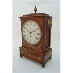 A George IV mahogany bracket timepiece, having fusee movement and enamelled Roman dial, the case...
