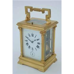 Favre Leuba & Co., Bombay - a gilt brass-cased carriage clock, having minute repeat/alarm movemen...