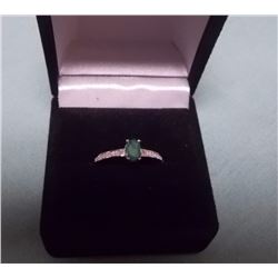 RING - .52CT OVAL FACETTED GREEN EMERALD AND DIAMONDS IN STERLING SILVER SETTING - INCLUDES CERTIFIC