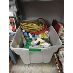 Tote of household cleaning supplies