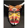 Image 1 : KWAG-UILTH 'HAWK MAN' MASK BY JAY BRABANT,  MASK FEATURES CEDAR BARK HAIR AND FEATHERS.